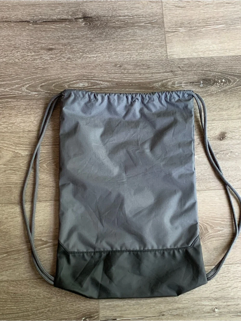 Nike Gray Drawstring Backpack with White Swoosh